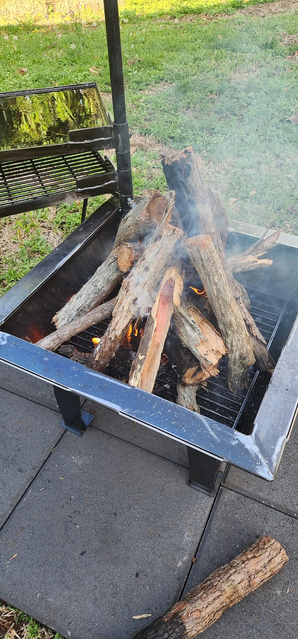 Backyard Fire Pit with Square Grill and Hot Plate.
